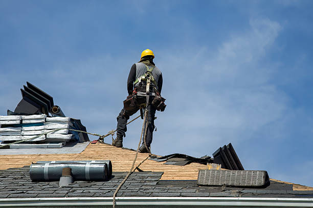 Professional Roof Replacement technician working in Hereford, PA